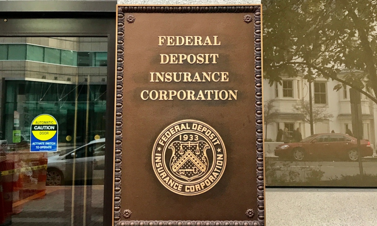 A gavel striking a block on a desk, symbolizing regulatory action, with a subtle overlay of digital currency symbols.