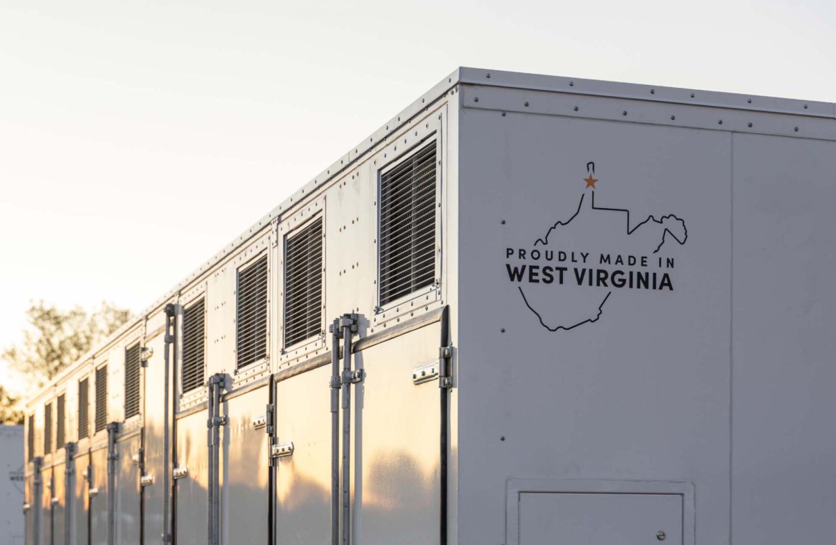 Conceptual illustration of Form Energy's large-scale iron-air battery system connected to a power grid.