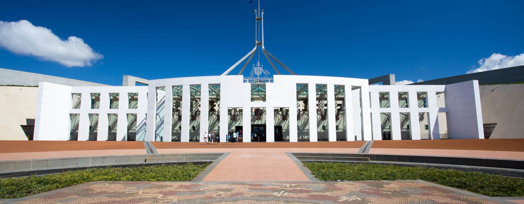 A stylized image of the Sydney Opera House with digital currency symbols interwoven.
