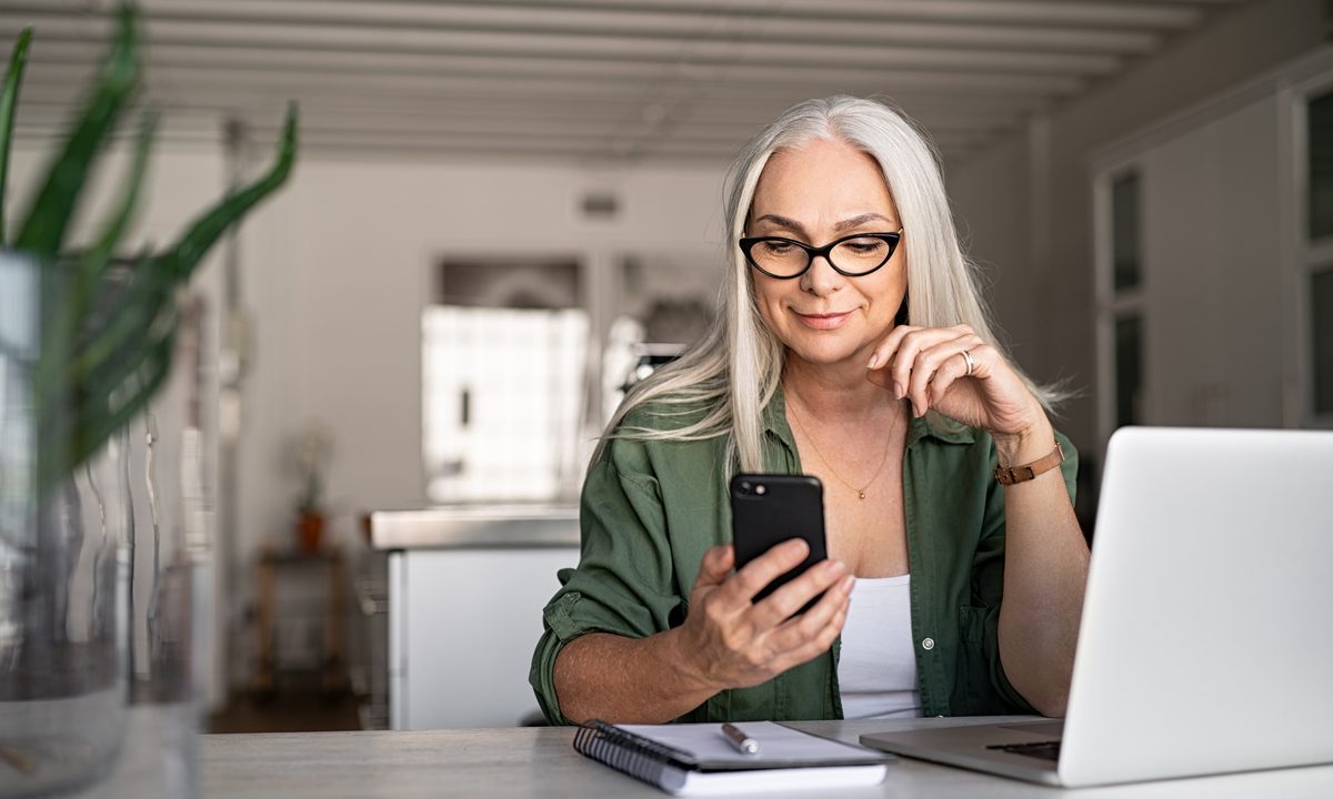 Smartphone screen showing social media feed transitioning to loan application interface