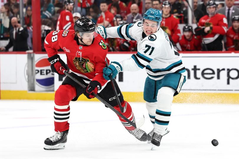 A graphic showing the NHL logo and CFTC logo connected by lines, symbolizing a partnership.