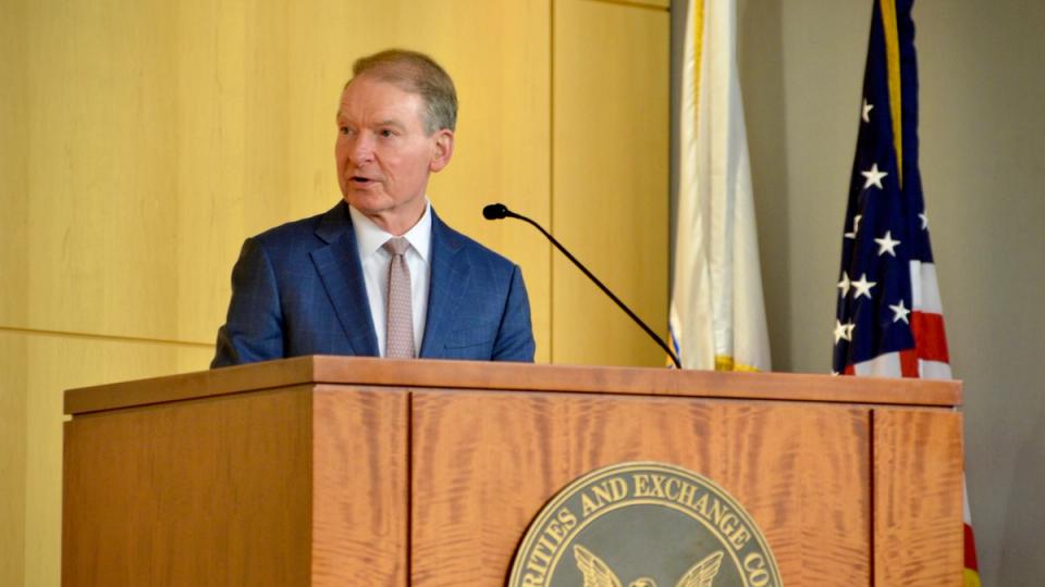 SEC Chairman Paul Atkins speaking at a podium.