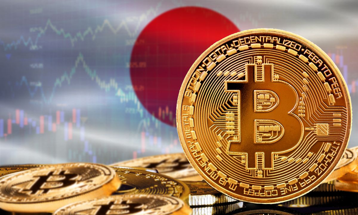 Japanese Yen banknotes and Bitcoin symbol on a table.