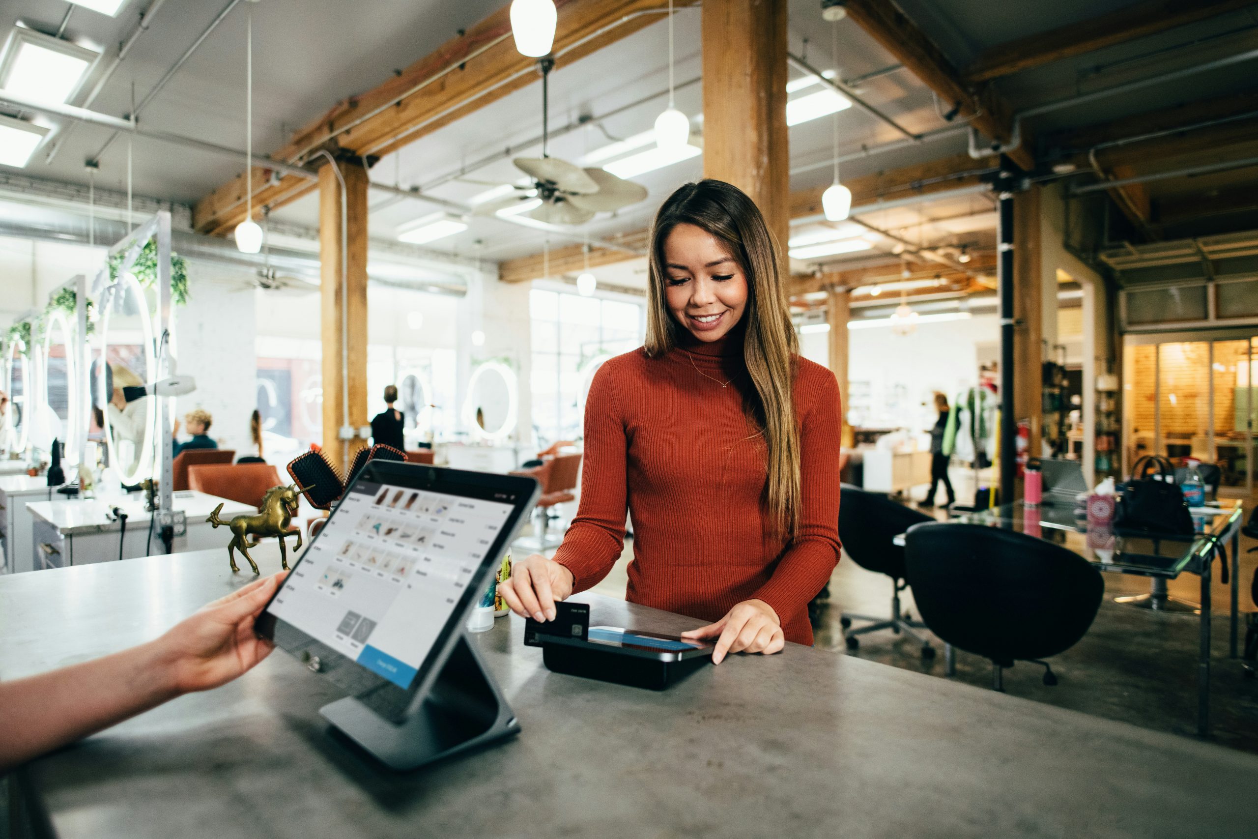 A financial analyst reviewing complex data on a computer screen, symbolizing the need for organized and accurate KYC records.