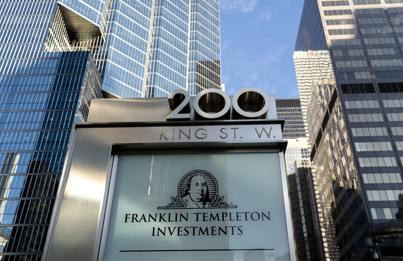 A digital representation of financial data flows with the Franklin Templeton and DigiFT logos subtly integrated.