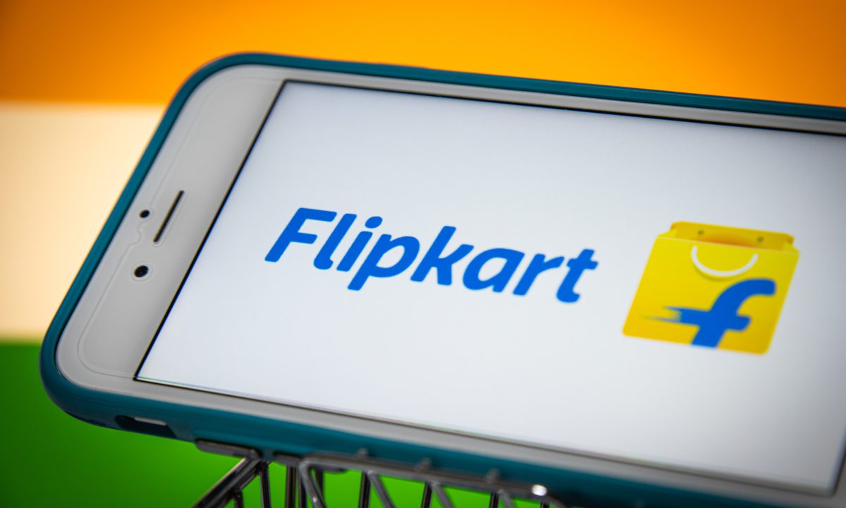 Walmart logo with a 'pause' symbol superimposed over the Flipkart logo